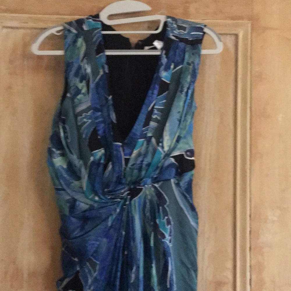 Below knee mid length dress. 100% silk.